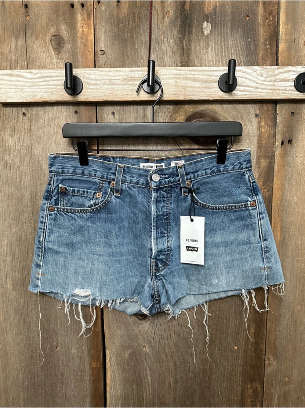 Levi's RE/DONE High Waisted Button Fly Cutoff Jean Shorts in Blue Wash Size 28